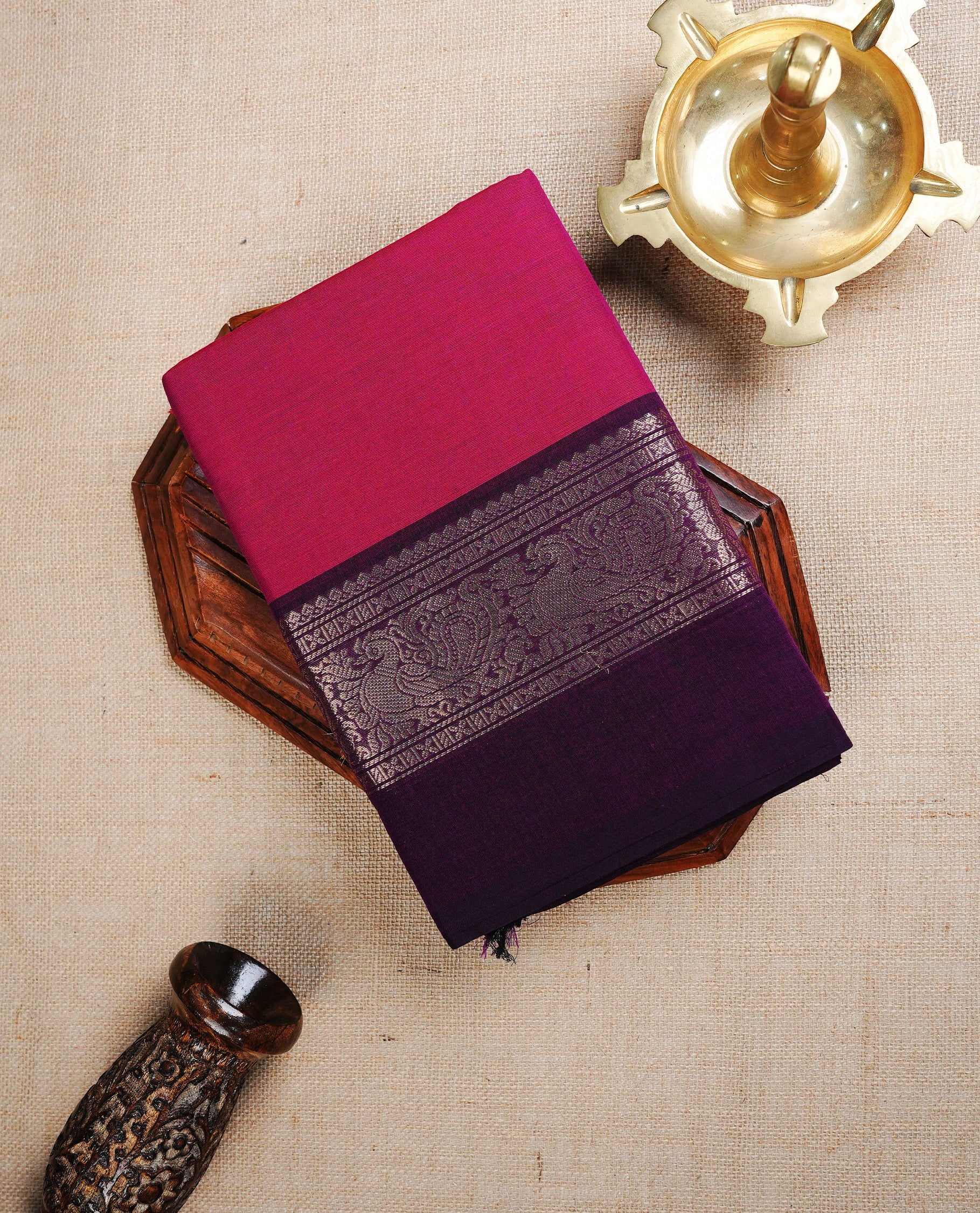 Magenta colour Chettinad Cotton Saree Featuring Plain Body , Complemented By Contrast Wine Colour With Peacock Gold Zari Border , Paired With Macting Blouse Piece.