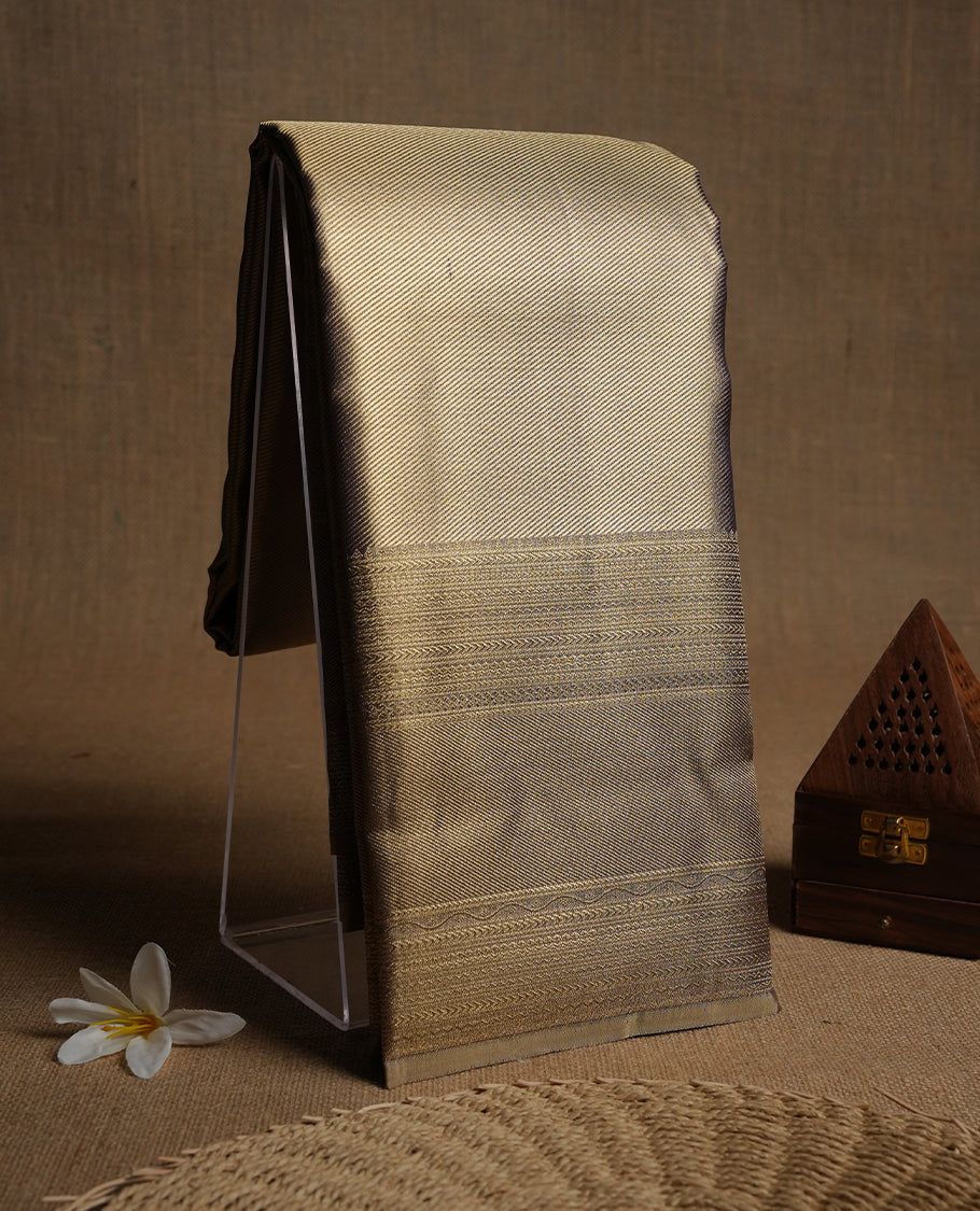 Purple & gold double shade colour kancheepuram tissue silk saree highlighting gold stripped zari pattern body, with self colour colour with traditional border and paired with matching blouse.