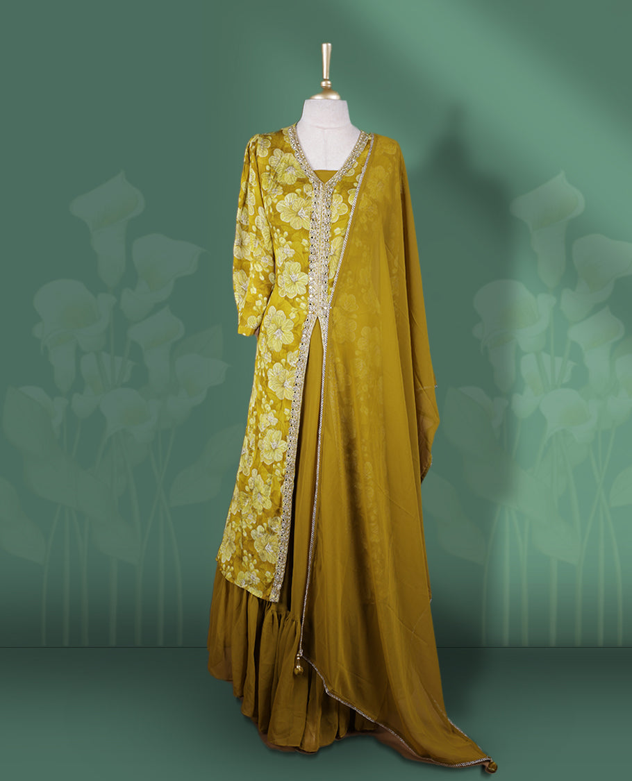 Mustard yellow Anarkali Suit with floral threadwork and sequin detailing on the front, Paired with a plain matching dupatta and gathered flared bottom & A perfect blend of elegance and festive flair.