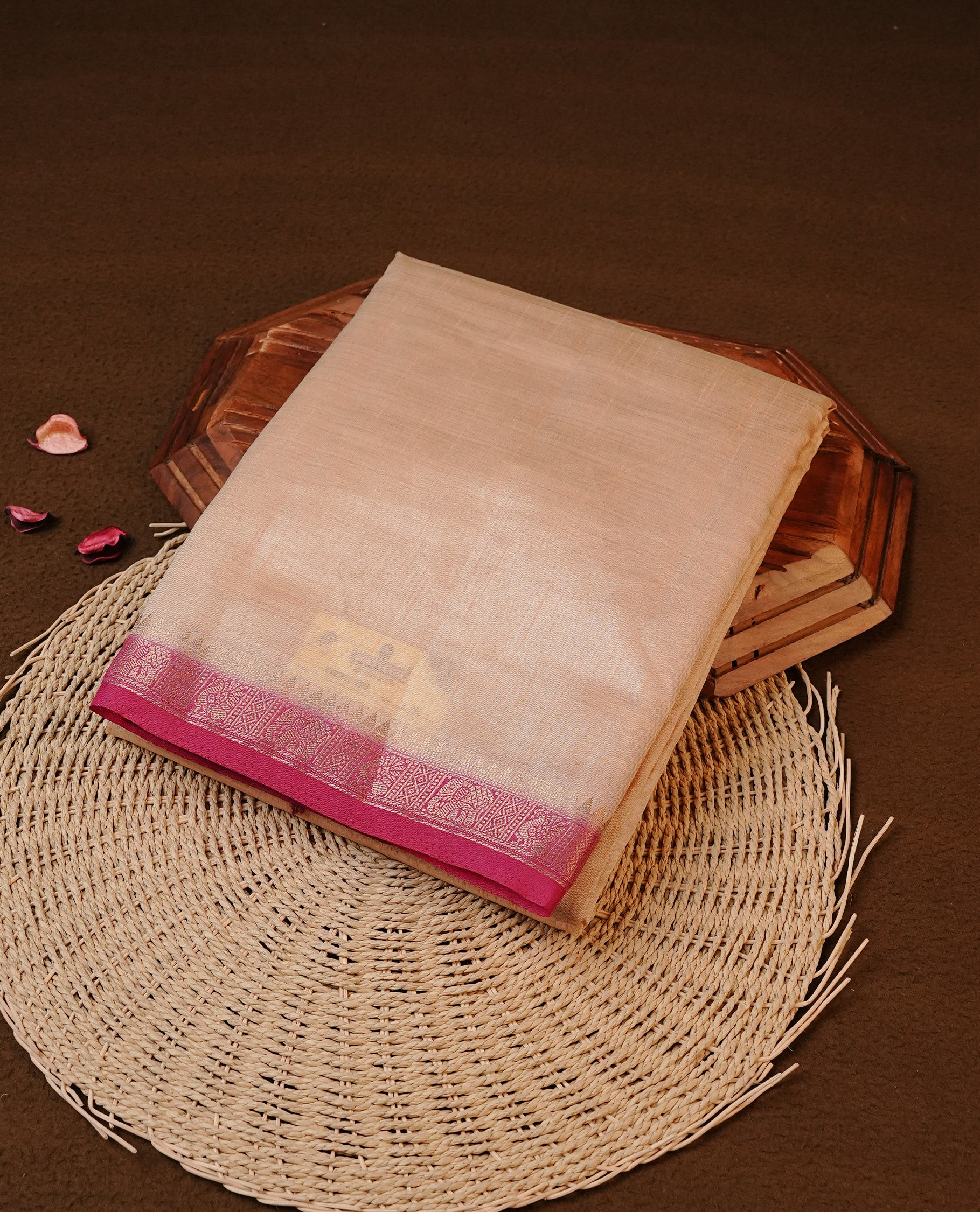 Cream colour Tussar silk saree Featuring Elegant Plain body, complemented by Contrast Magenta colour with gold zari border, paired with matching blouse piece.