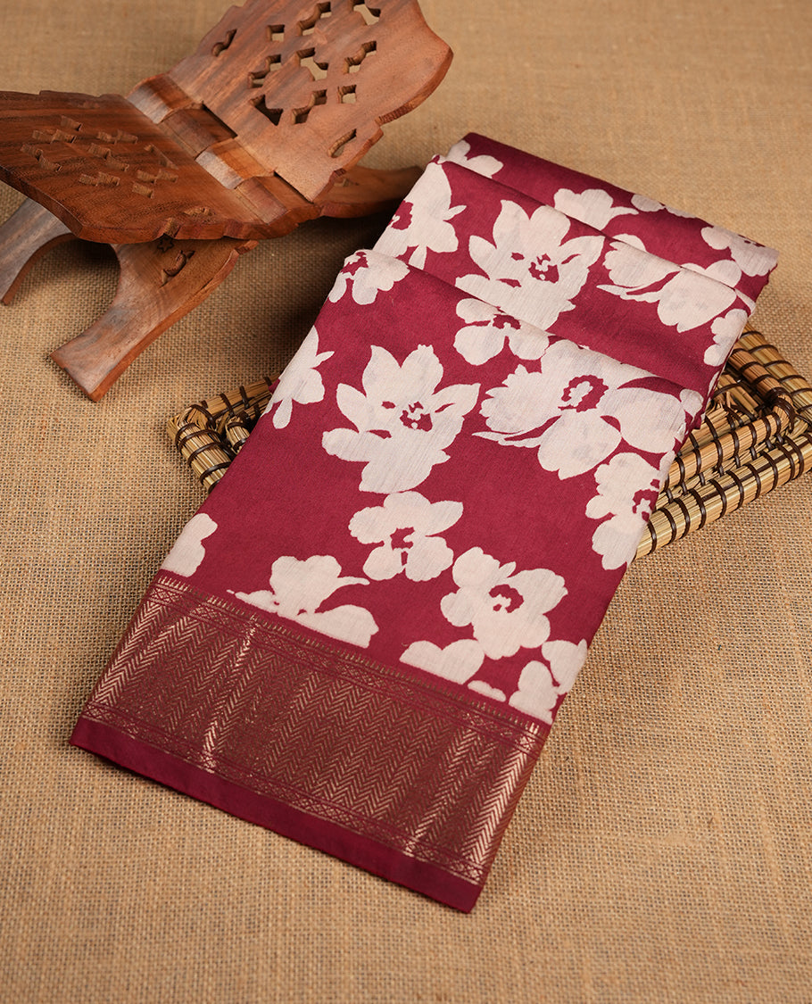 Brick Red colour Viscos semi printed saree featuring a light golden zari border, abstract off white printed motifs on the body, and comes with a matching blouse