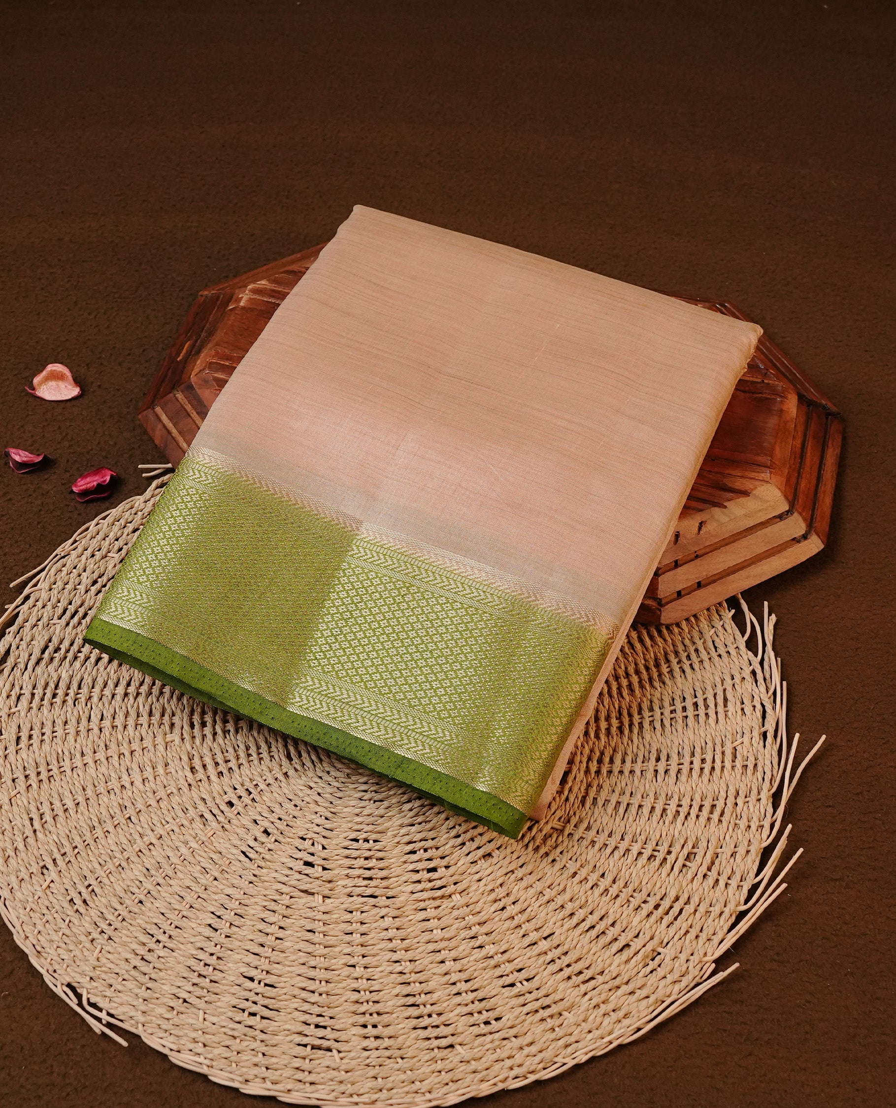 Cream colour Tussar silk saree Featuring Elegant Plain body, complemented by Contrast Light green colour with gold zari border, paired with matching blouse piece.