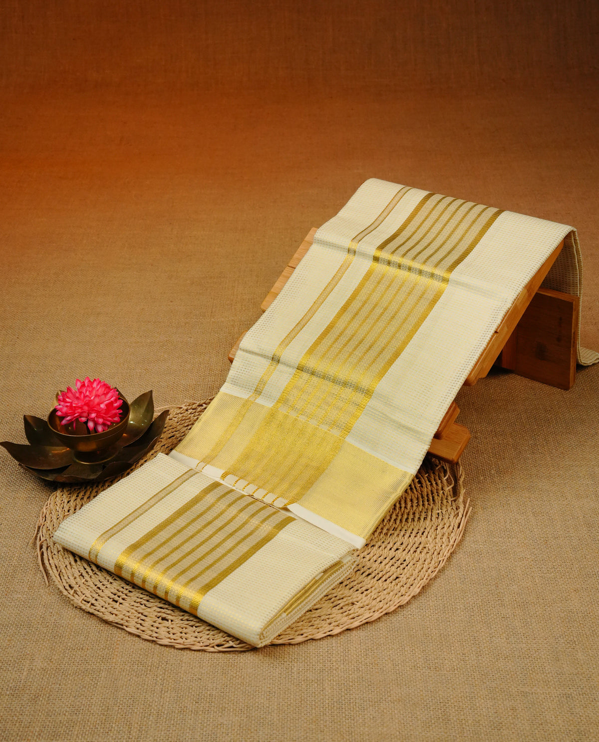 Cream colour cotton set mundu with Gold zari Dotted strips on body, featuring Gold zari kara.