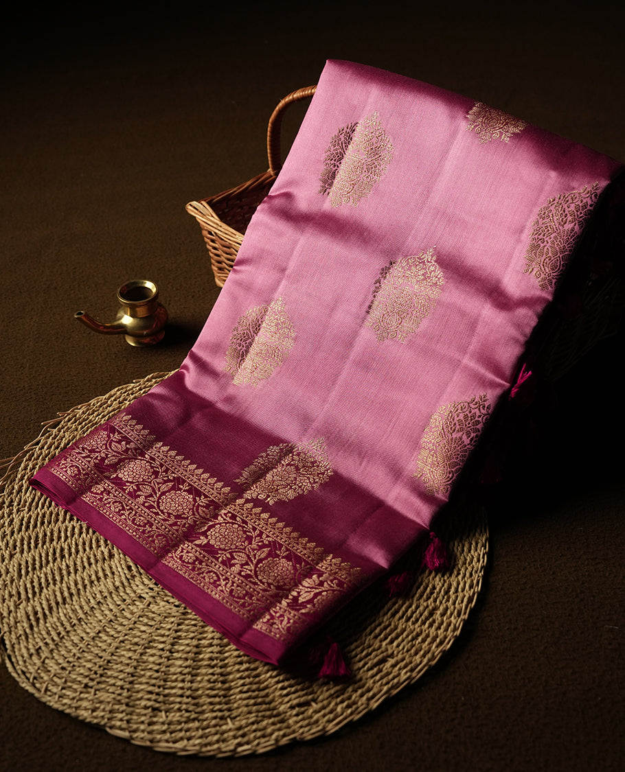 Pink Colour Banaras Soft Silk Saree with Gold Zari Diamond Buttas, Intricate Multi-Layered Floral Border, Grand Pallu with Paisley Motifs in Varying Pink and Maroon Tones, and Matching Blouse.