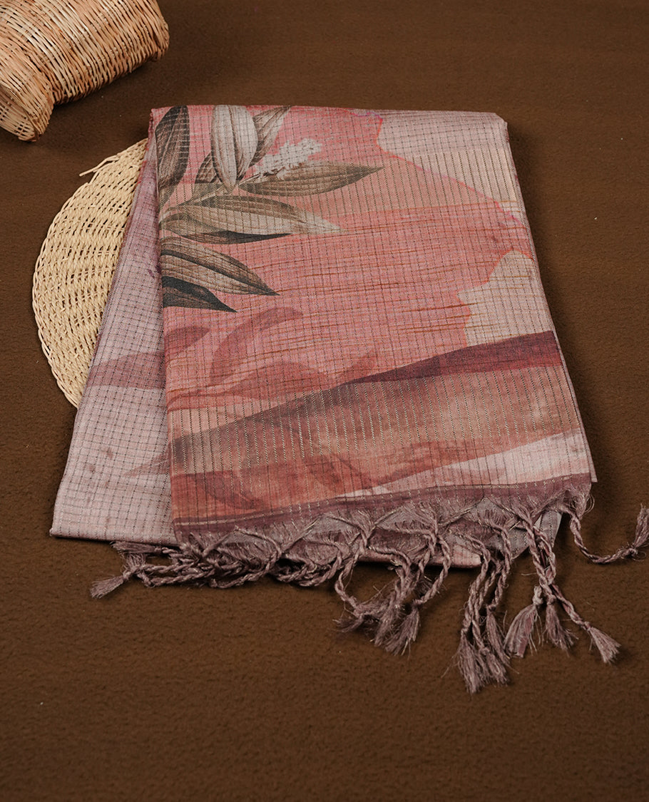 Coral Peach colour semi tussar silk saree featuring floral print across body, contrast peach colour border and pallu, paired with matching blouse piece.