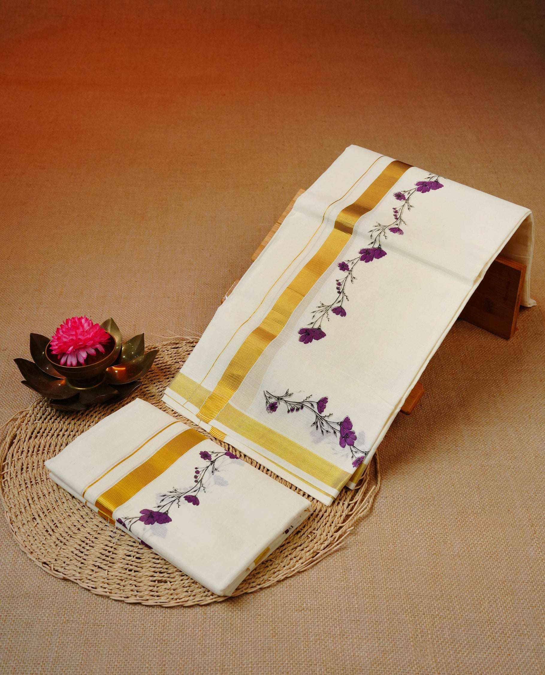 Cream colour cotton set mundu featuring gold Kasav with Floral kodi kara.