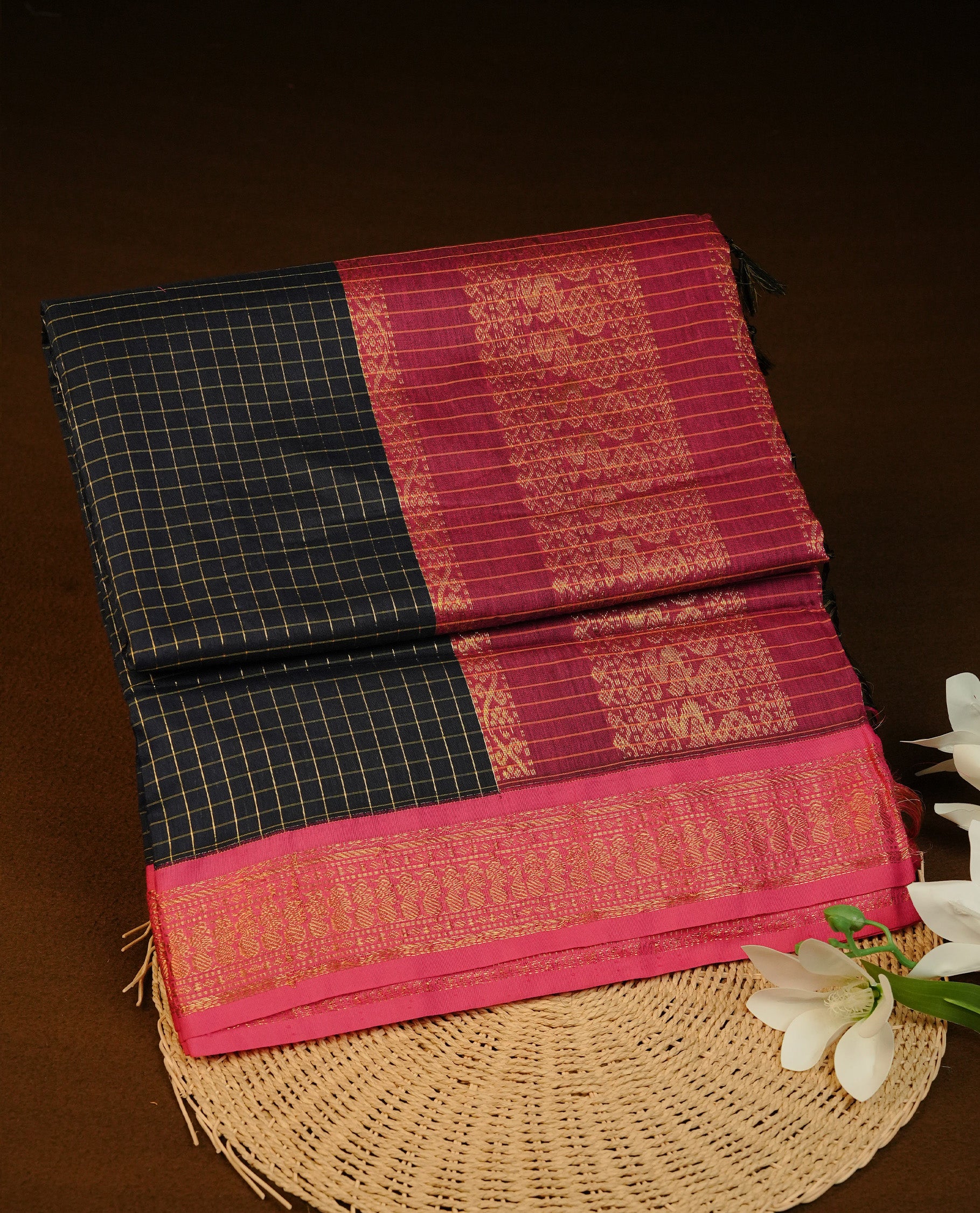 Navy Blue colour Kalyani cotton saree featuring Gold zari check pattern on body, complemented by Contrast Purple colour with grand gold zari border & pallu, matching blouse piece