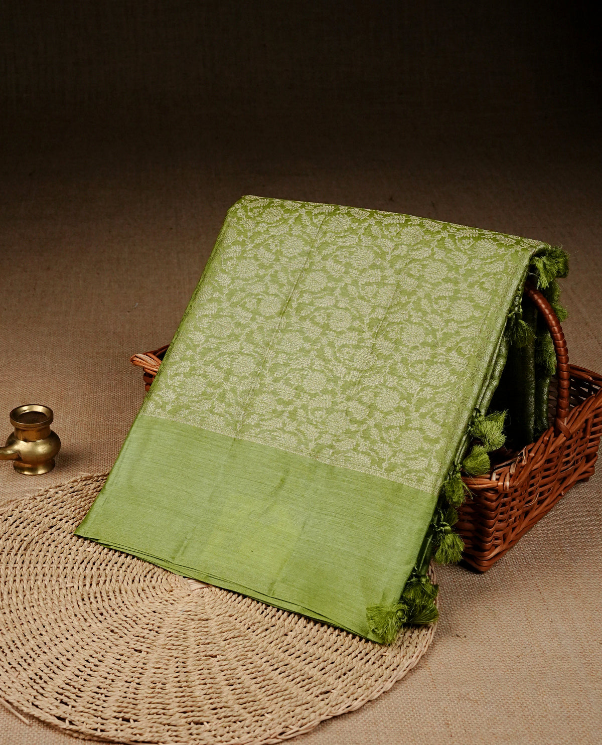 Light green Colour banaras saree featuring Light gold zari Floral kodi pattern on body, complemented by borderless finish, comes with matching blouse piece.