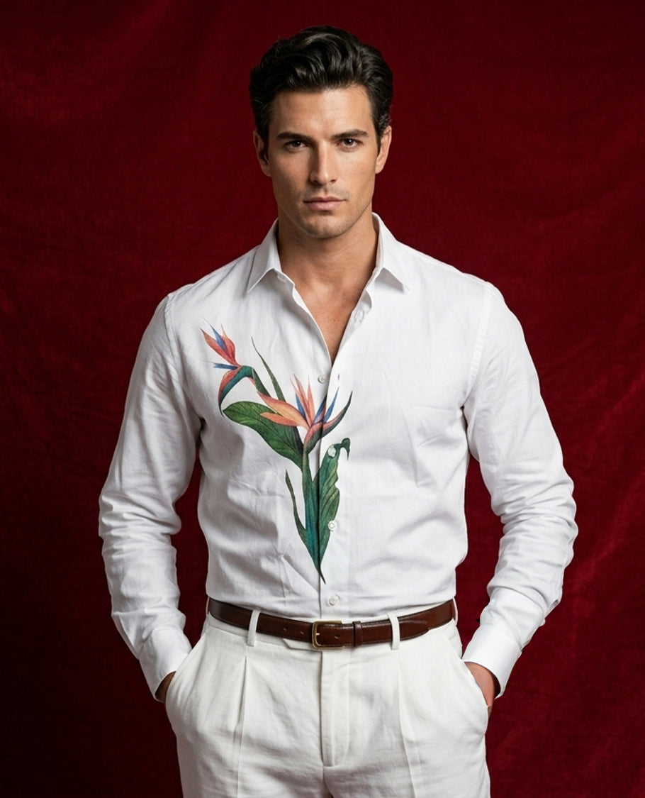 White colour shirt designed with Leaf print on body, adored with full sleeve.