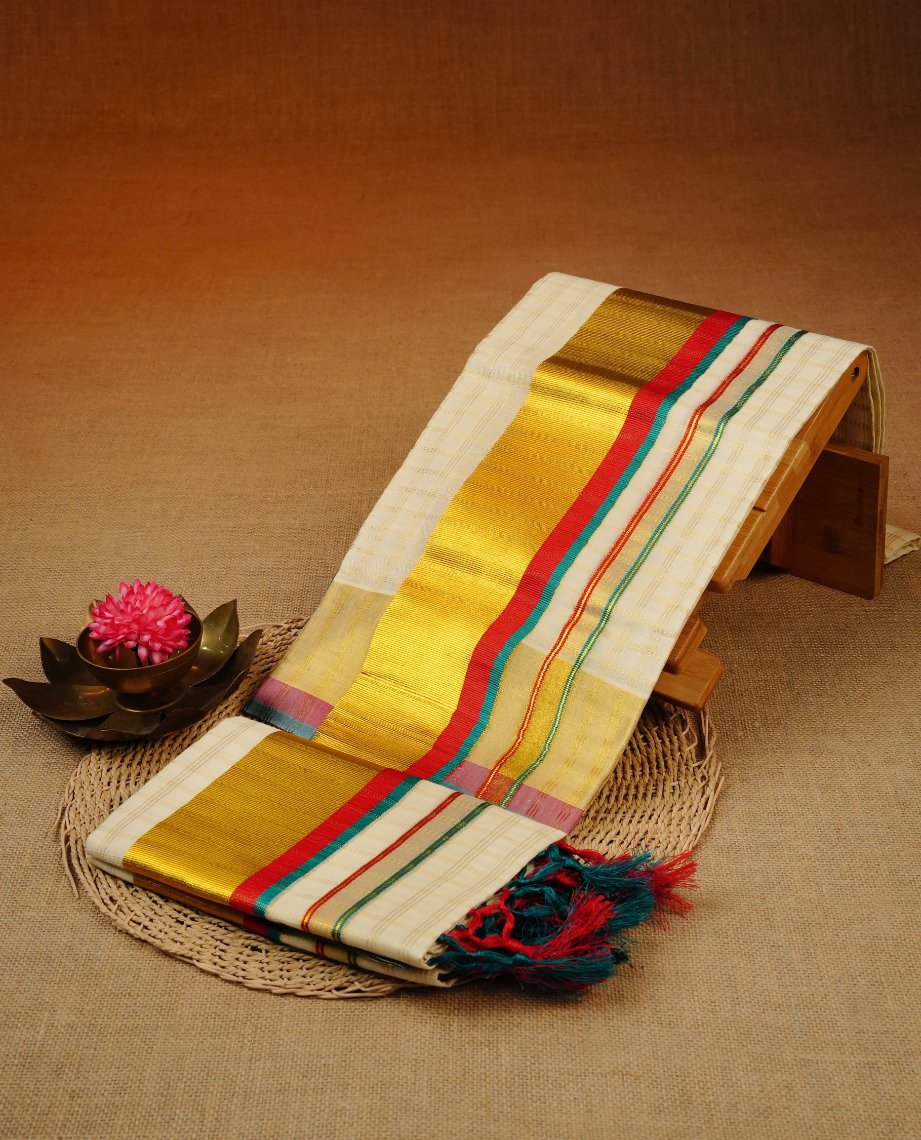 Cream colour cotton Set Mundu With Gold zari check on body, enhanced with Green, Red & gold zari kara.