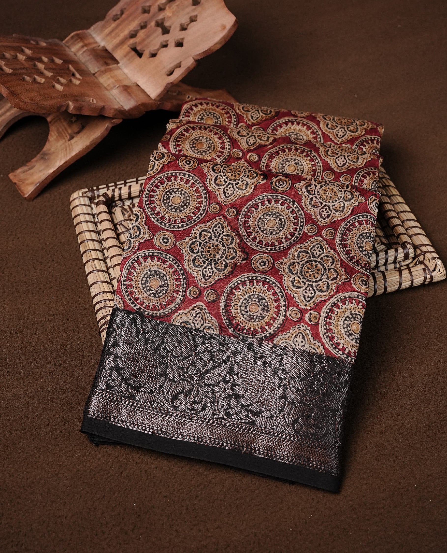 Red colour Chanderi silk saree featuring Print on body, complemented by Black colour with Antique zari border, paired with matching blouse piece.