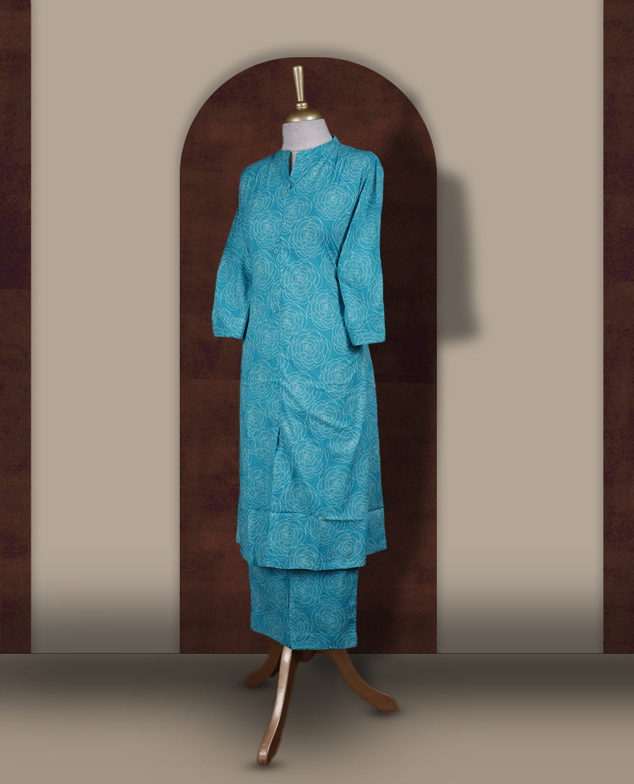 Sky blue colour coord set featuring elegant floral prints all over, mandarin collar, and sheer 3/4 sleeves, Paired with matching pants, it offers a sleek, modern look perfect for refined casual wear.