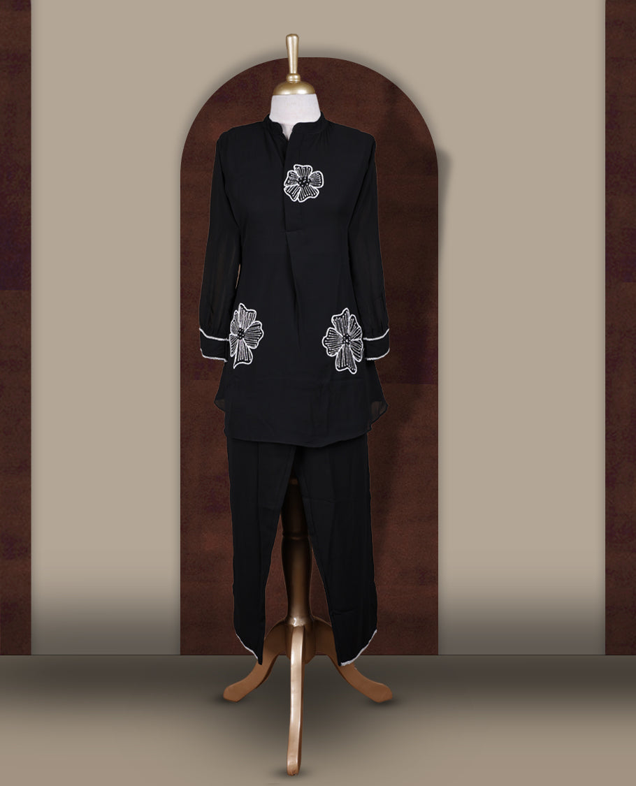 Black colour coord set featuring elegant pearls and cut beads floral embroidery work, mandarin collar, and sheer 3/4 sleeves, Paired with matching pants, it offers a sleek, modern look perfect for refined casual wear.