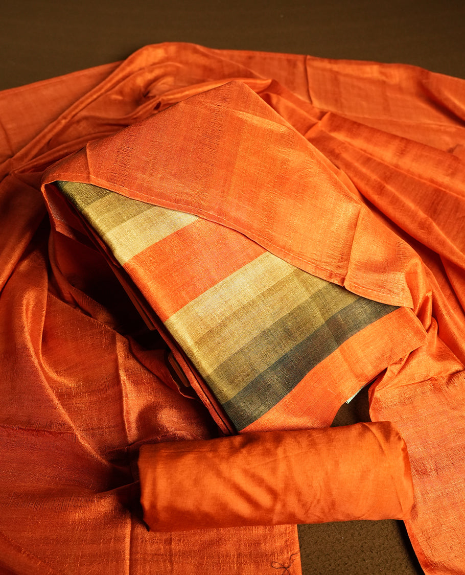 Orange colour churidhar material featuring elegant horizontal stripes on the yoke and dupatta, woven in shades of Green and Orange & Paired with a matching plain bottom