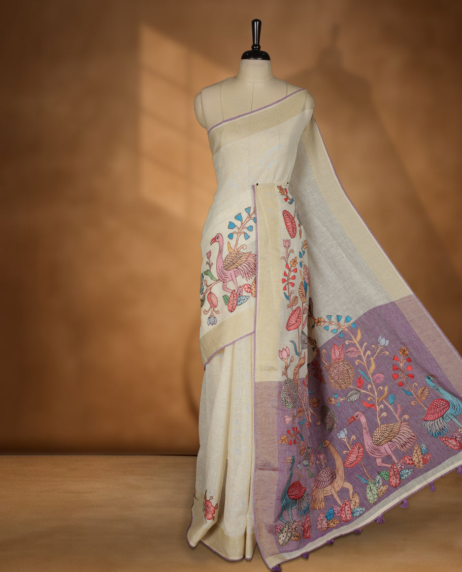 Cream colour cotton linen silk saree featuring Floral & brids printed pattern on body, golden simple border with Lavender colour pallu and comes with a matching blouse