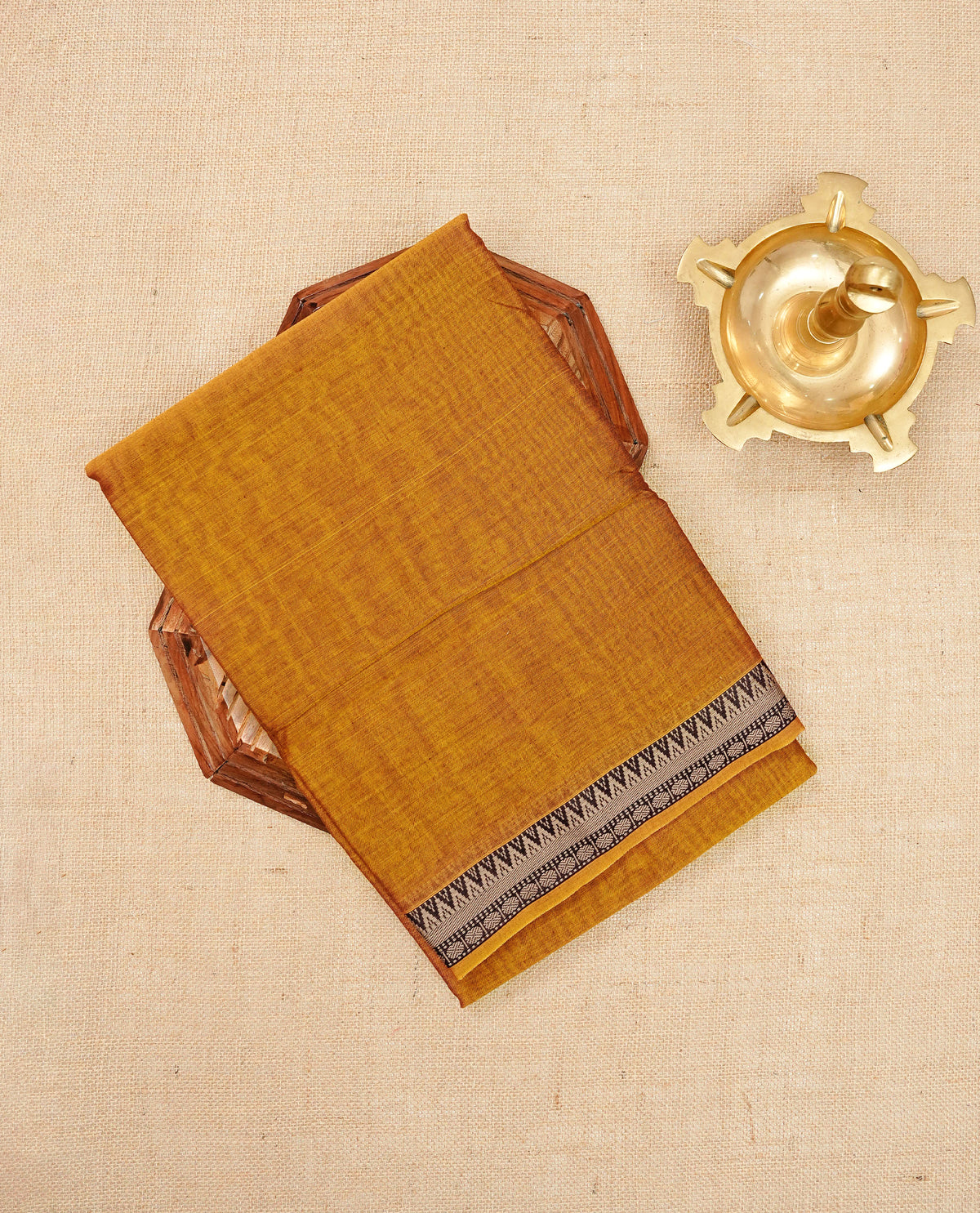 Mustard Yellow Narayanapattu Cotton Saree featuring a plain body , beautifully complemented by a black temple-designed border & Contrast pallu, paired with a matching blouse piece.