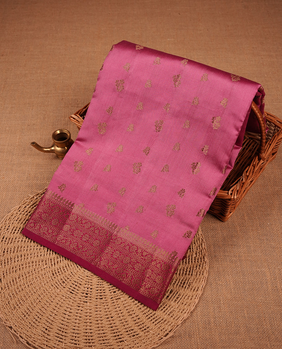 Pink colour Pure banaras soft silk saree featuring Antique zari motifs on body, contrast magenta colour border , traditional pallu and paired with matching blouse