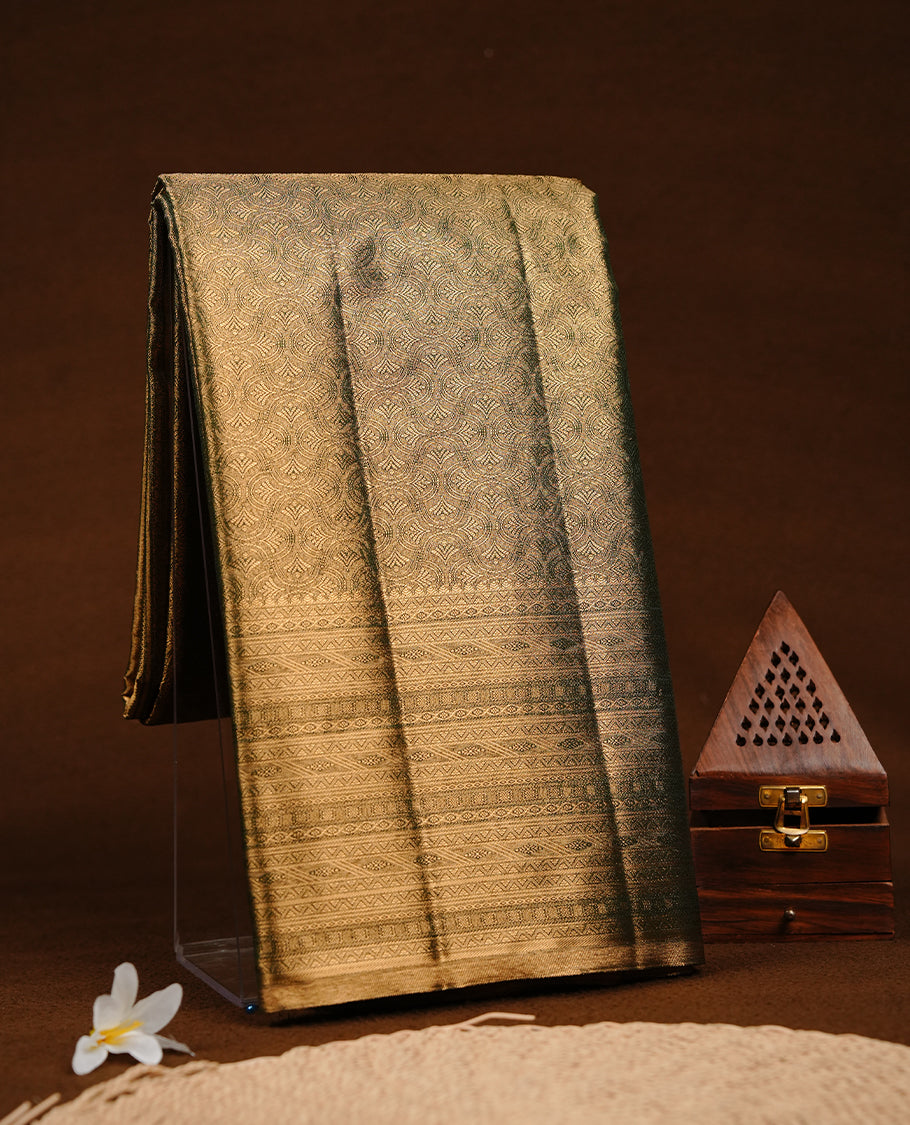 Green & Gold double shade colour semi tissue silk saree featuring gold zari pattern on body, selfcolour with gold zari traditional border, paired with matching blouse piece.