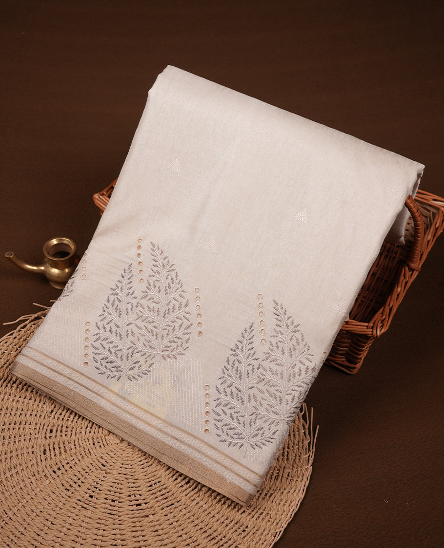 Beige colour Tussar silk saree featuring Elegant plain body, highlighting Grey colour Leaf cut work with Light gold zari border, pallu and paired with matching blouse piece.