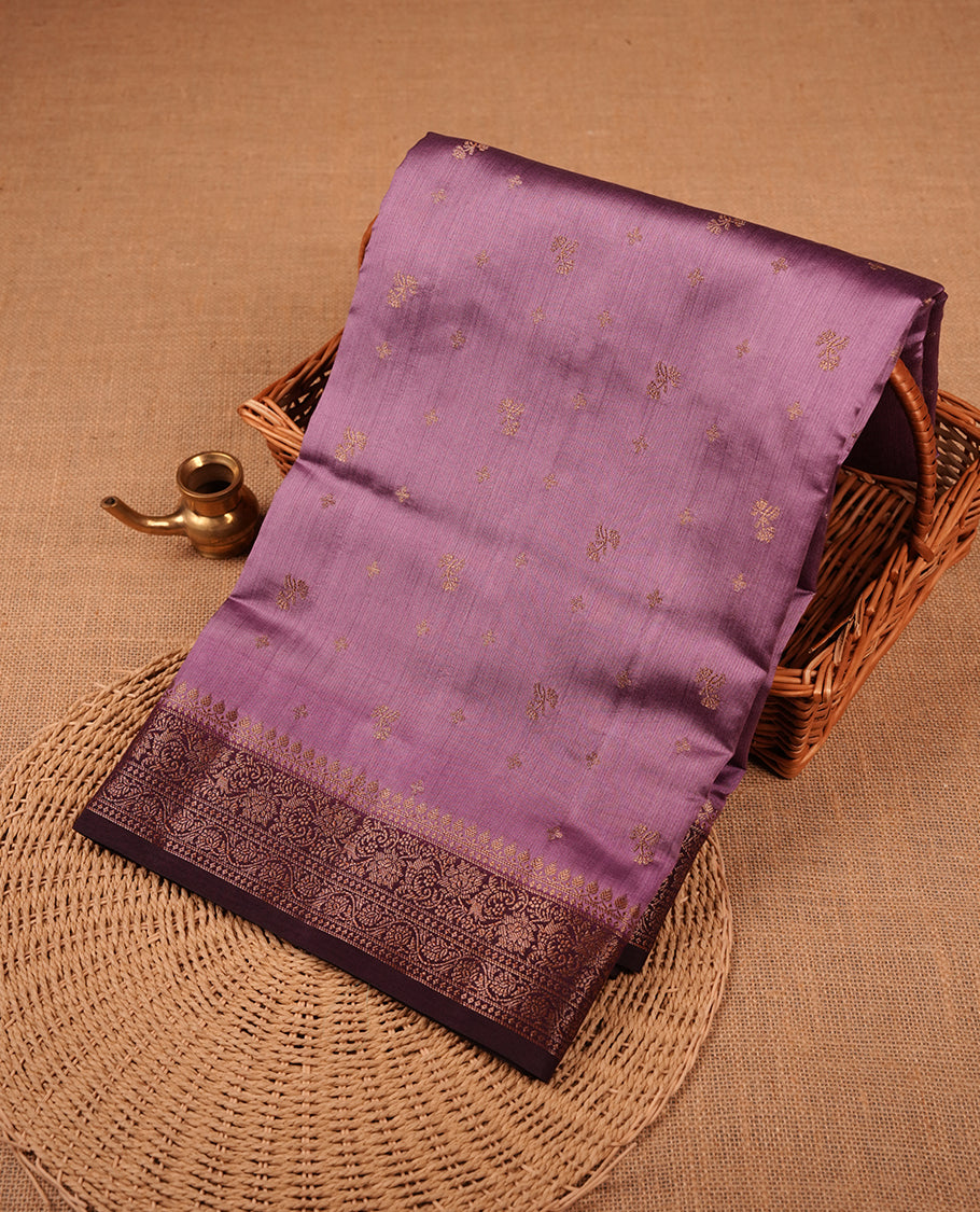 Deep lavender colour Pure banaras soft silk saree featuring Antique zari motifs on body, contrast Blackberry colour border , traditional pallu and paired with matching blouse