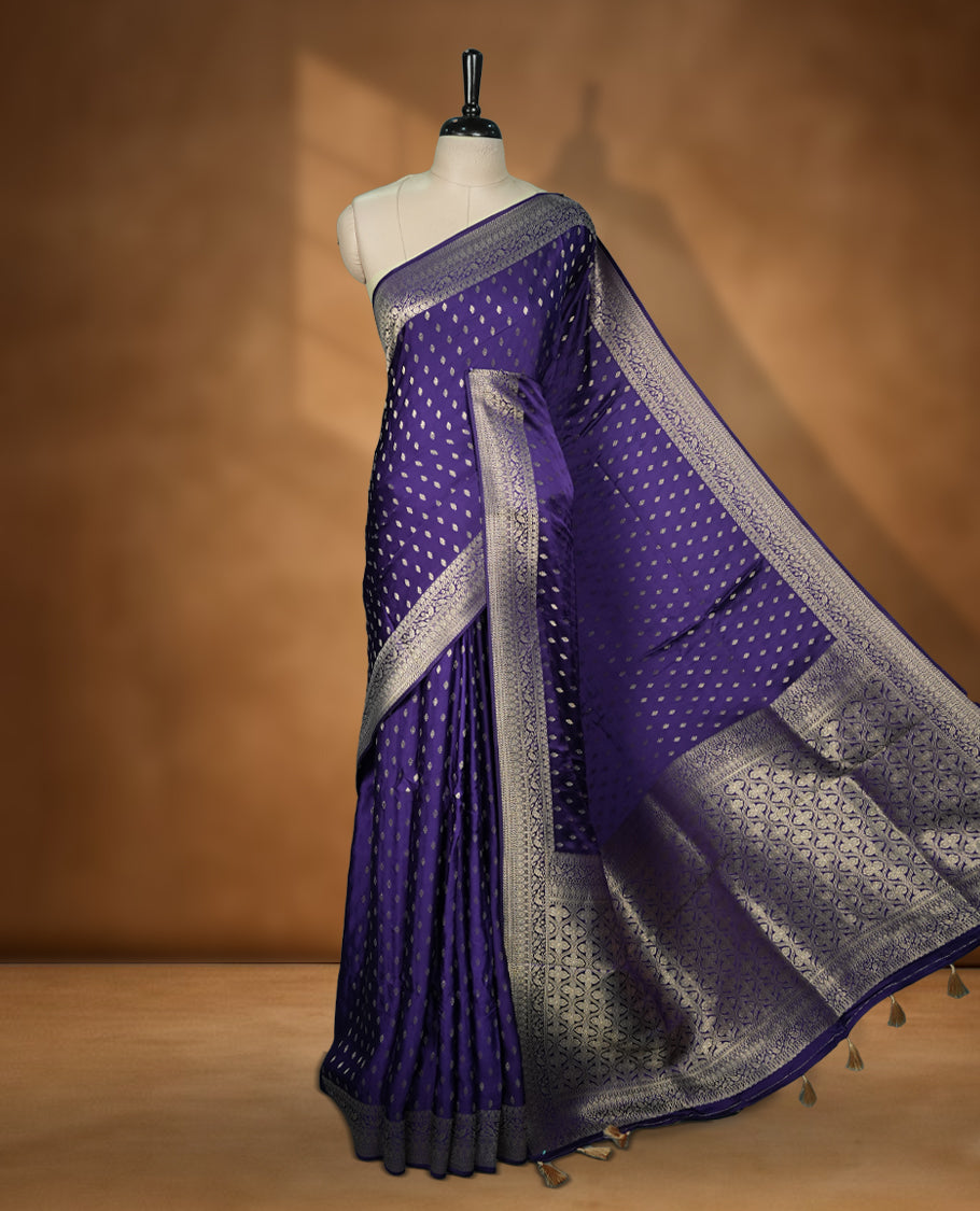 Navy Blue Colour Semi Banarasi Satin Crepe Saree with Silver Zari Buti Motifs, Traditional Gold Ornamental Pallu, Elaborate Woven Border, Decorative Tassels with Matching Blouse