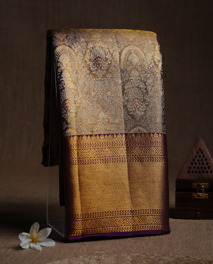 Gold & purple colour kancheepuram tissue silk saree featuring gold zari floral kodi pattern on body, complemented by contrast purple colour with traditional border, paired with matching blouse piece.