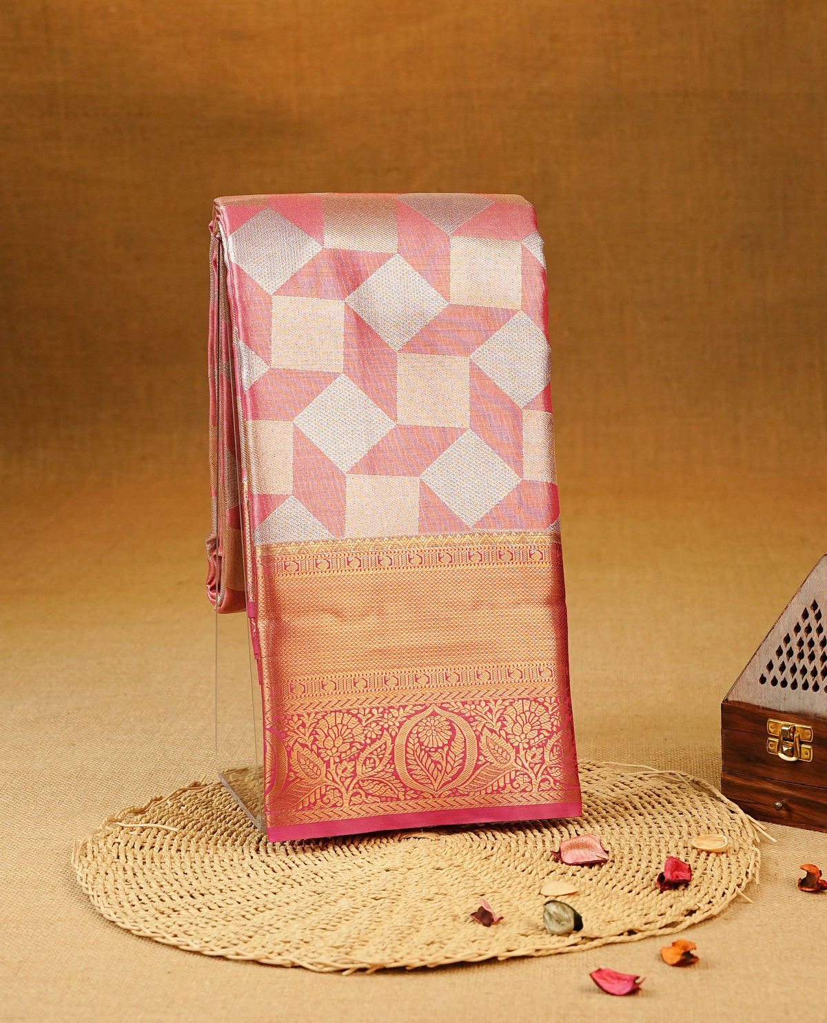 Rose Gold Colour Semi Tissue Silk Saree featuring shimmering gold and silver geometric box motifs on the body, complemented by an intricately woven floral zari pallu, a rich pink and gold zari border, and paired with a matching plain blouse piece