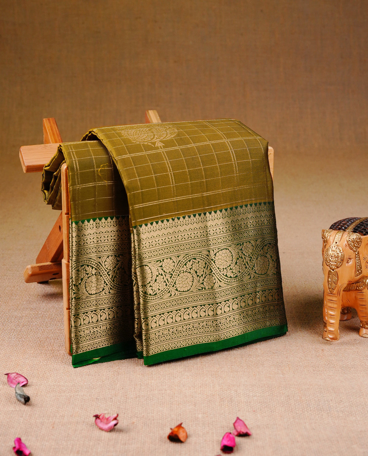 Mustard olive Colour Traditional Kancheepuram Silk Saree with Gold Zari Checks & motifs on the Body, Enhanced with a Contrast Green Colour with Grand Gold Zari Border and Rich Pallu, Paired with a Matching Blouse Piece.