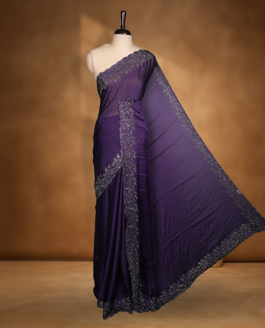 Dark Purple Colour Chiffon Designer Saree featuring Delicate White Stone Work All Over the Body, with Stone Detailing on the Border and Pallu, paired with a Matching Blouse.