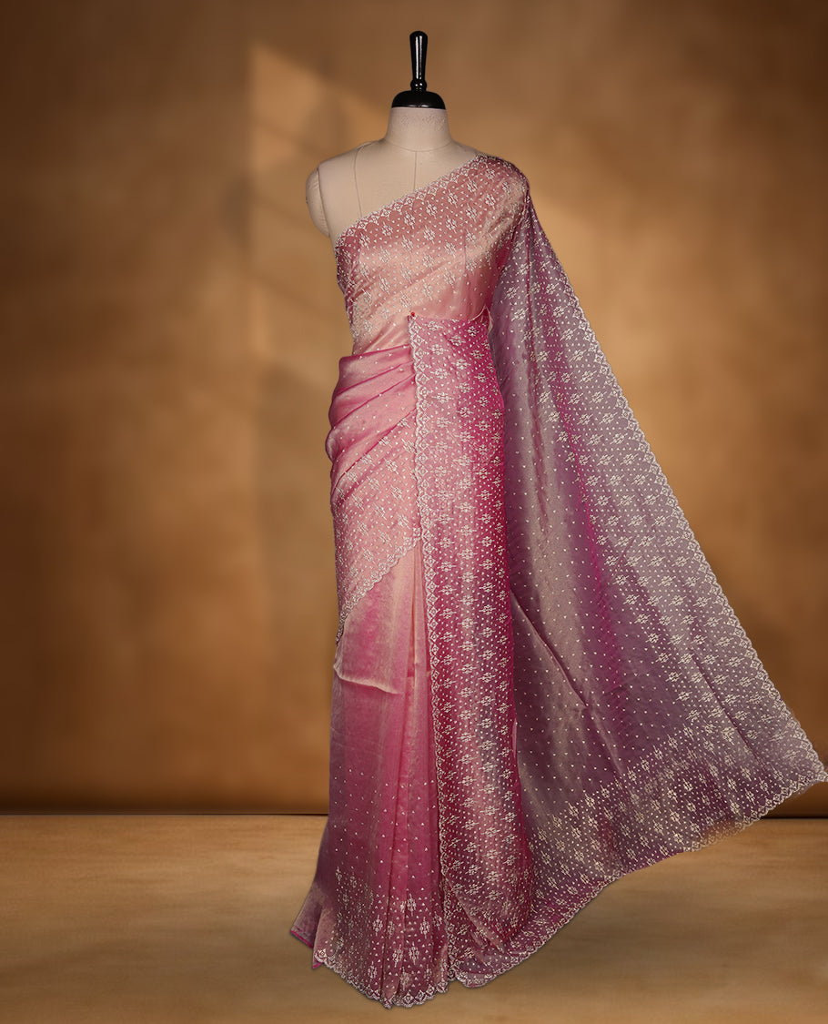 Pink Colour Shimmer Designer Saree featuring Delicate White Stone Scattered Work on the Body, enhanced with Intricate Stone Detailing on the Border and Pallu, paired with a Matching Blouse.