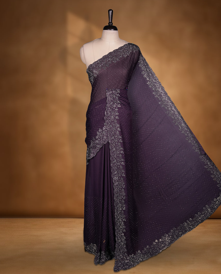 Dark Purple Colour Chiffon Designer Saree featuring Delicate White Stone Work All Over the Body, with Stone Detailing on the Border and Pallu, paired with a Matching Blouse.