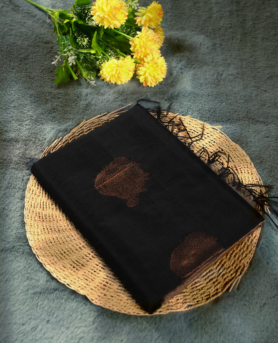 Black colour soft silk cotton saree adorned with copper zari motifs and a shimmering copper zari border, Enhanced by a beautifully rich beige colour woven pallu & Comes with a matching blouse piece for a complete look.