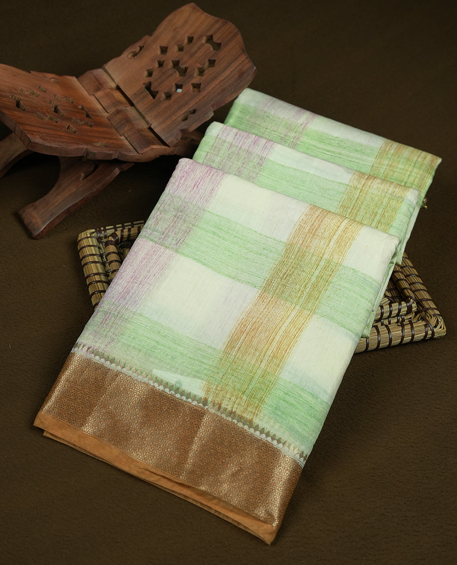 Multicolor mixed chanderi cotton saree with pastel checkered body in pink, green, yellow and off-white, golden zari border, matching golden pallu, and matching blouse.