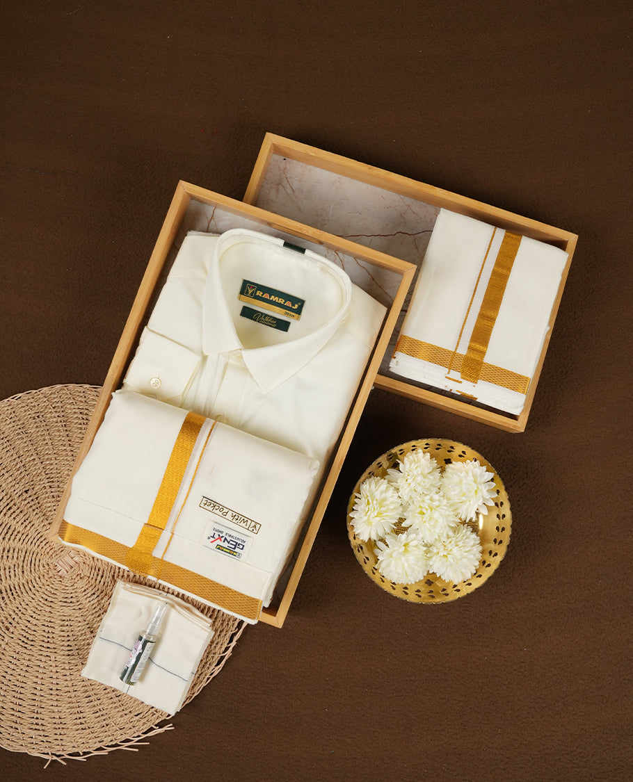 RAMRAJ Cream Colour shirt paired with a matching dhoti and towel, all elegantly finished with a gold border.