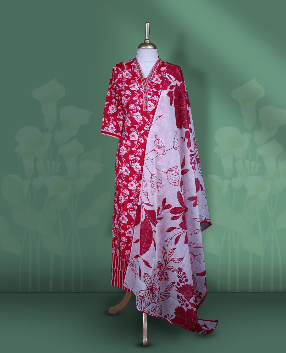 Raspberry colour churidar set featuring V neckline, sleeves, and white colour floral pattern across the body, Paired with a matching colour dupatta