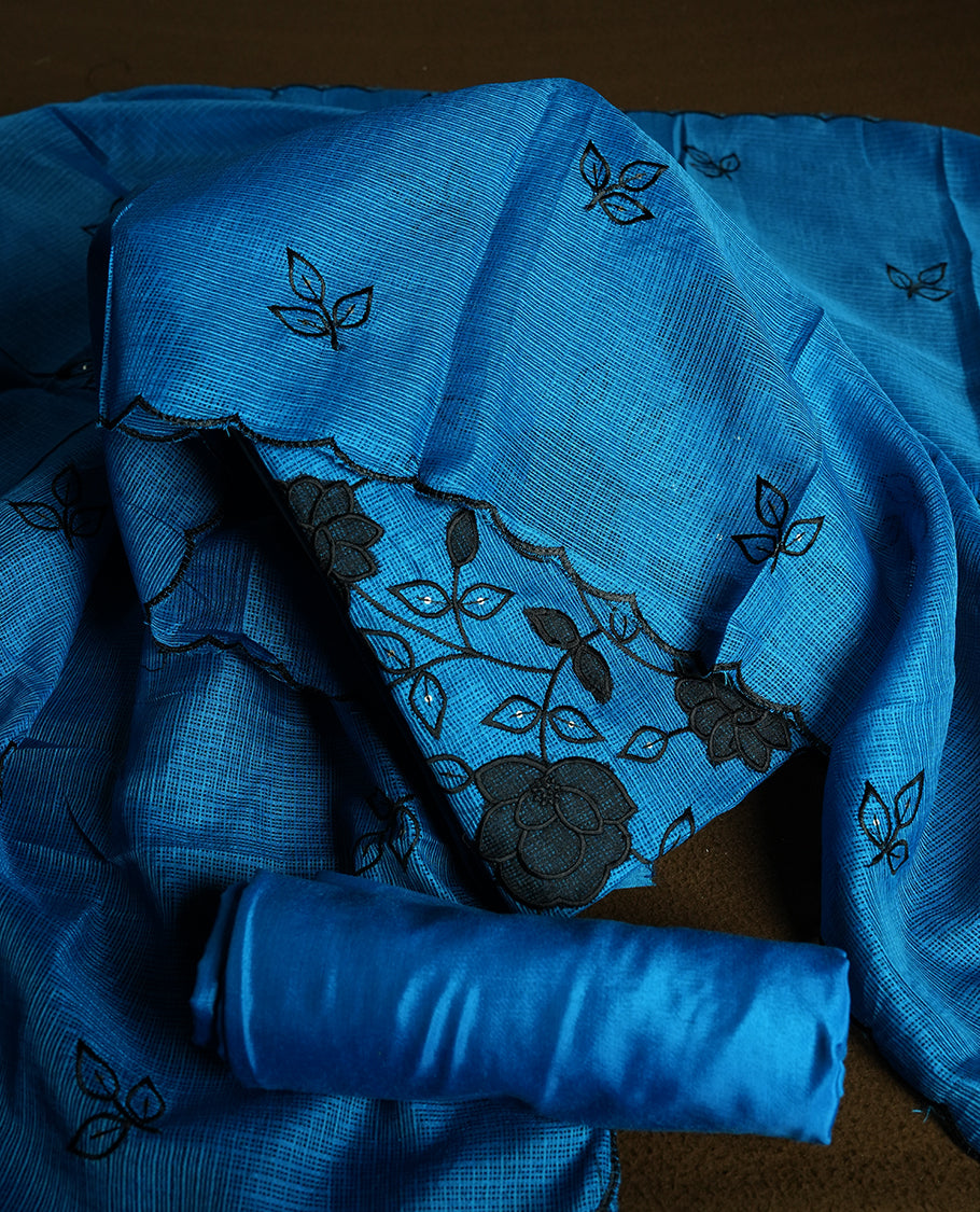 Blue colour churidhar material featuring Black colour thread embroidery on the front panel, self colour dupatta with elegant border, and matching plain bottom