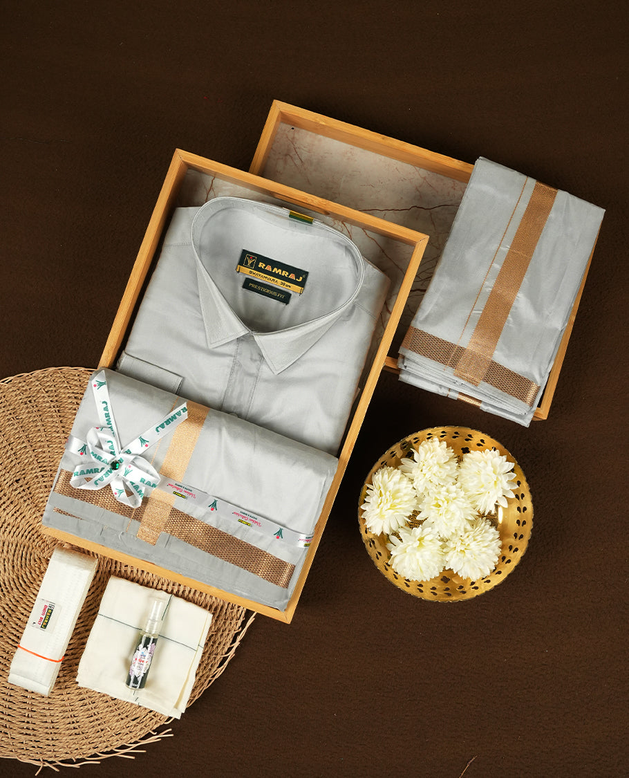 RAMRAJ Silver Grey Colour kurtha paired with a Silver Grey dhoti and a Silver Grey towel, elegantly finished with a matching Gold border.