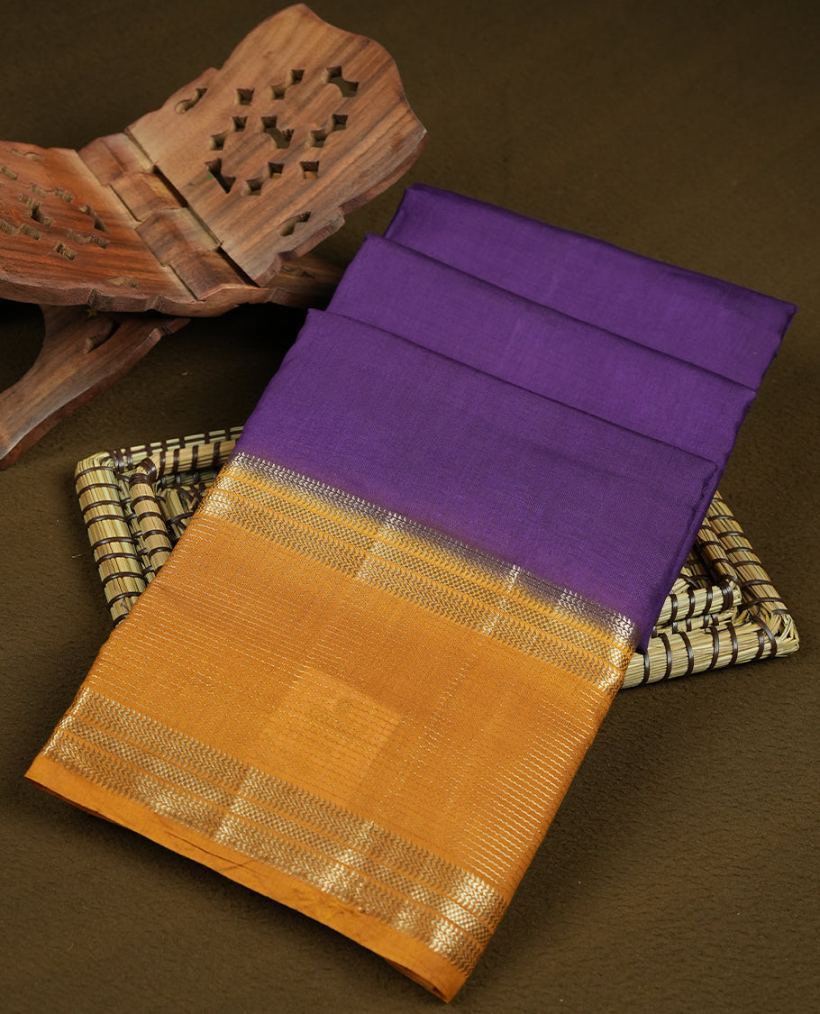 Deep purple colour mixed chanderi cotton saree with plain body, mustard yellow pallu and border with gold zari, and matching mustard blouse.