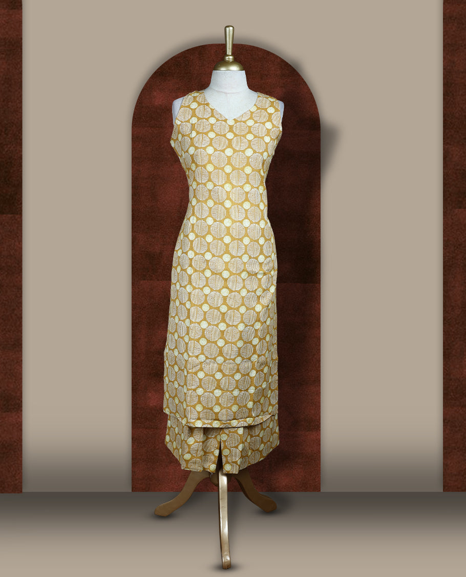 Mustard yellow colour coord set crafted in soft fabric, featuring a sleeveless V neck top with geometric circular prints, paired with a matching straight fit bottom.