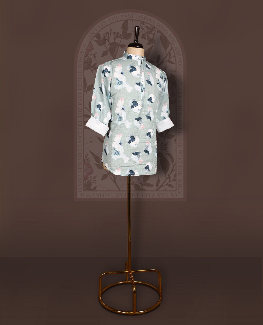 Pastel green colour short kurta in crush fabric with digital floral print, Features a mandarin collar and full sleeves, Lightweight, modern, and perfect for casual or semi-formal occasions.