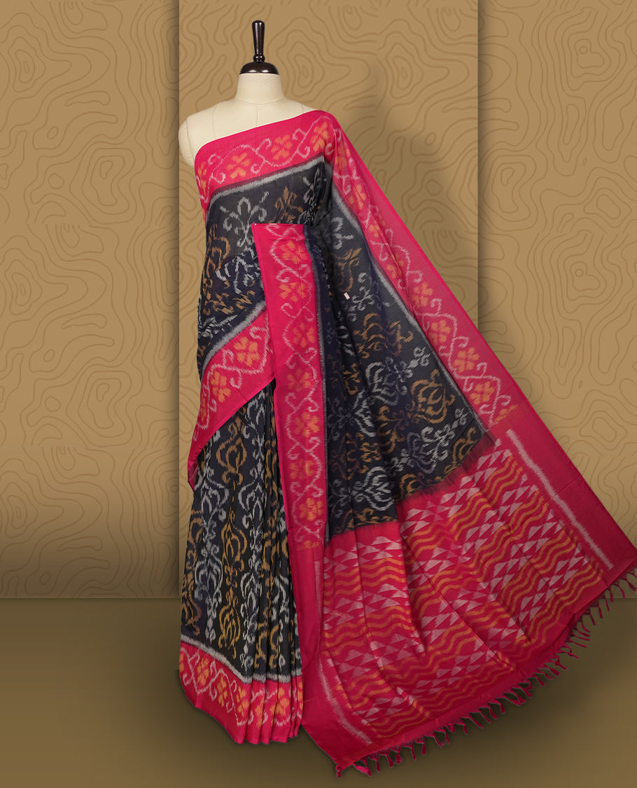 Navy blue colour Ikkat Pochampally saree featuring bold geometric motifs in beige, mustard, and grey with a striking contrast border, beautifully blending tradition with elegance, Comes with matching blouse.