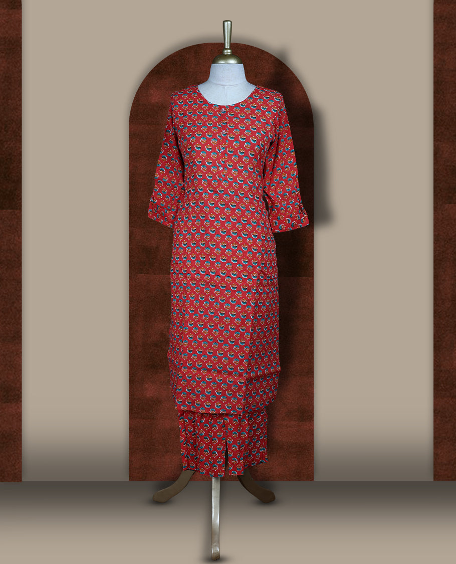 Red colour coord set adorned with all over floral prints, featuring a straight cut kurta with round neckline and 3/4th sleeves, paired with matching bottoms.