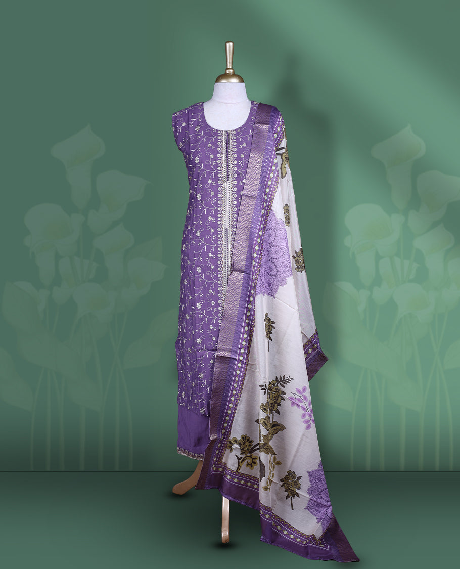 Purple colour churidar set featuring elegant white thread embroidery on the neckline, sleeveless, and scattered motifs across the body, Paired with a matching embroidered floral printed pattern dupatta