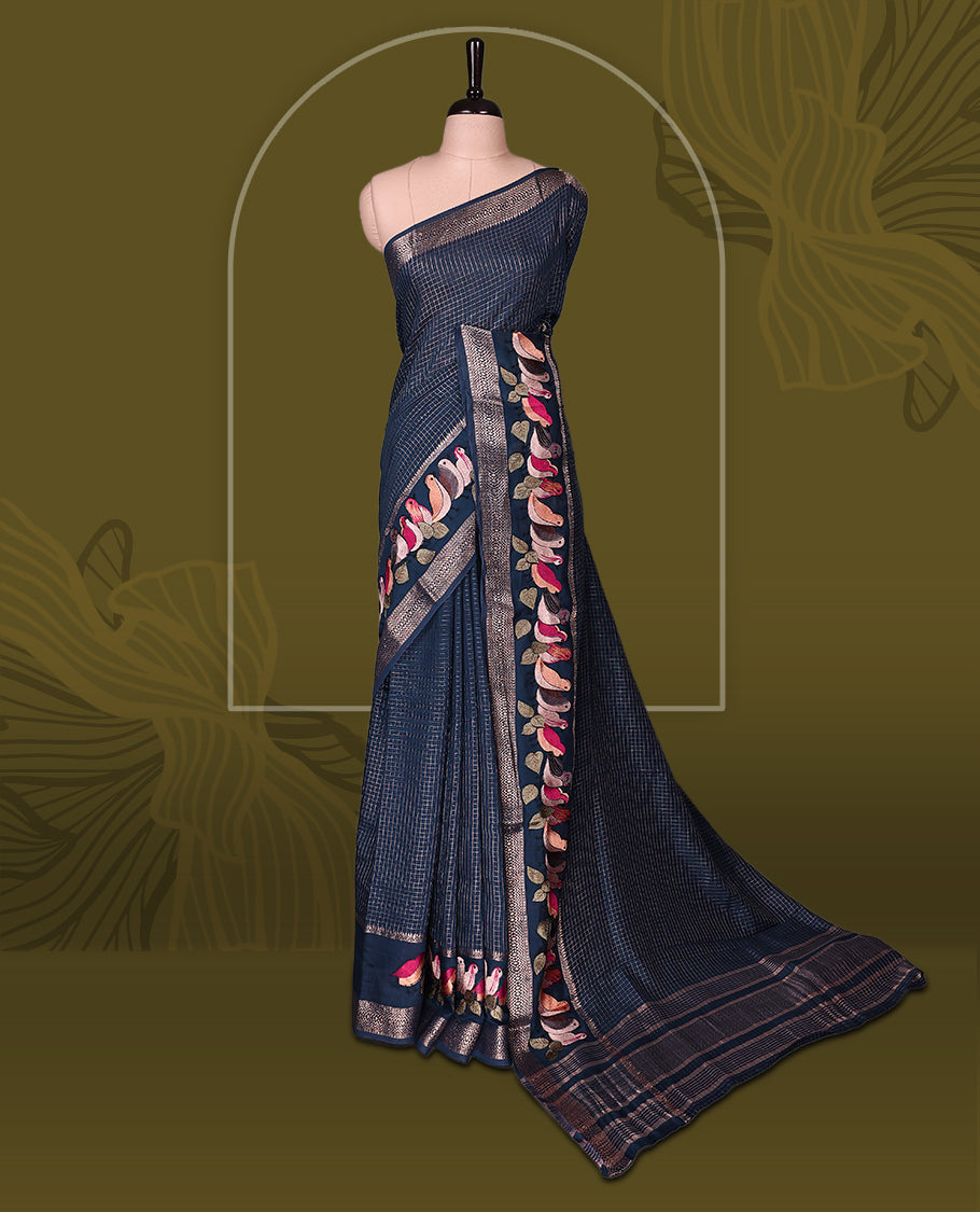 Navy Blue viscose saree featuring subtle checkered patterns and a beautifully embroidered bird motif border, paired with a rich pallu & perfect for festive occasions, celebrations, and elegant gatherings.