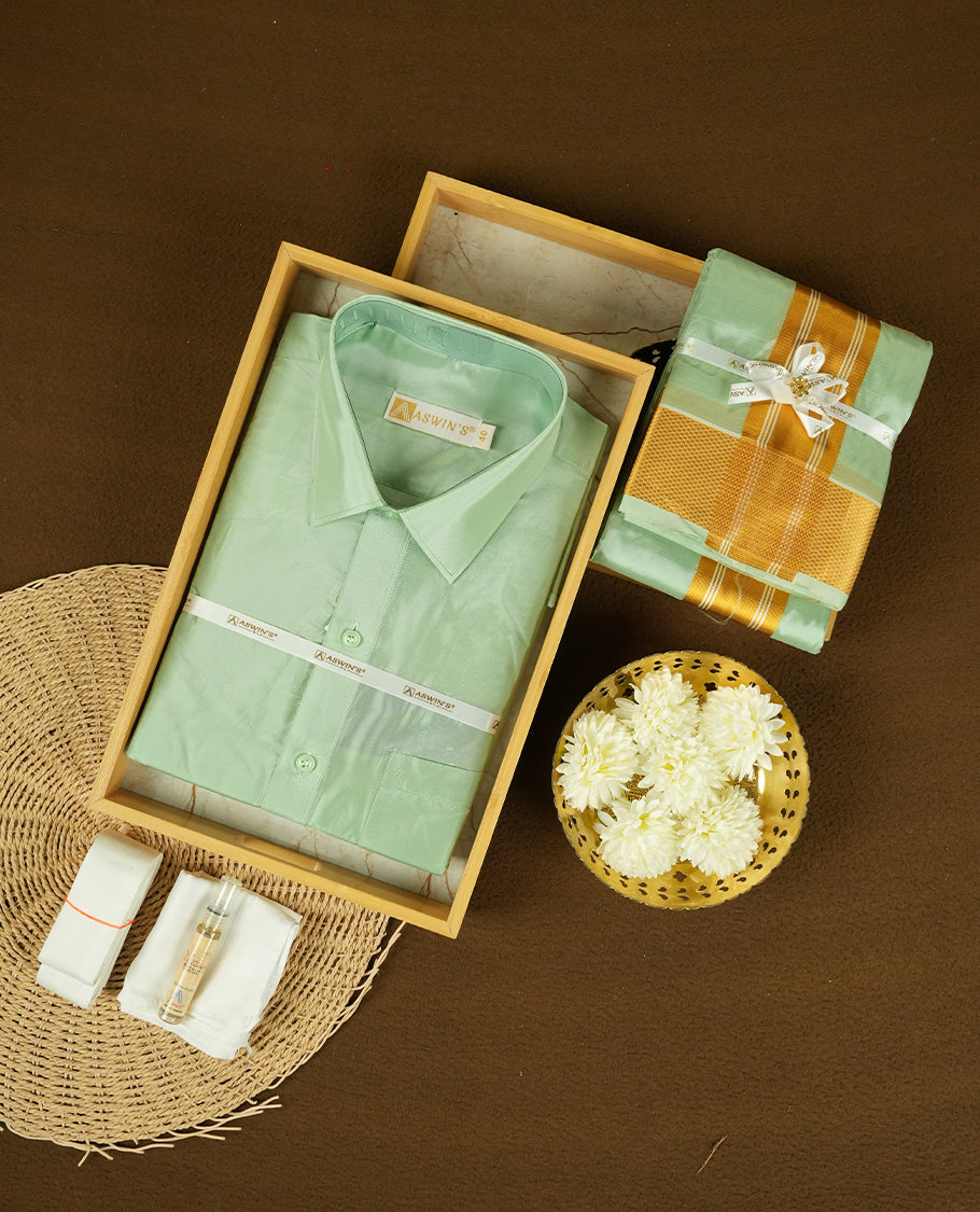 Pista colour Aswin’s wedding set featuring a refined silk shirt and matching dhoti with gold zari detailing, crafted for timeless elegance and perfect for traditional weddings and festive occasions.