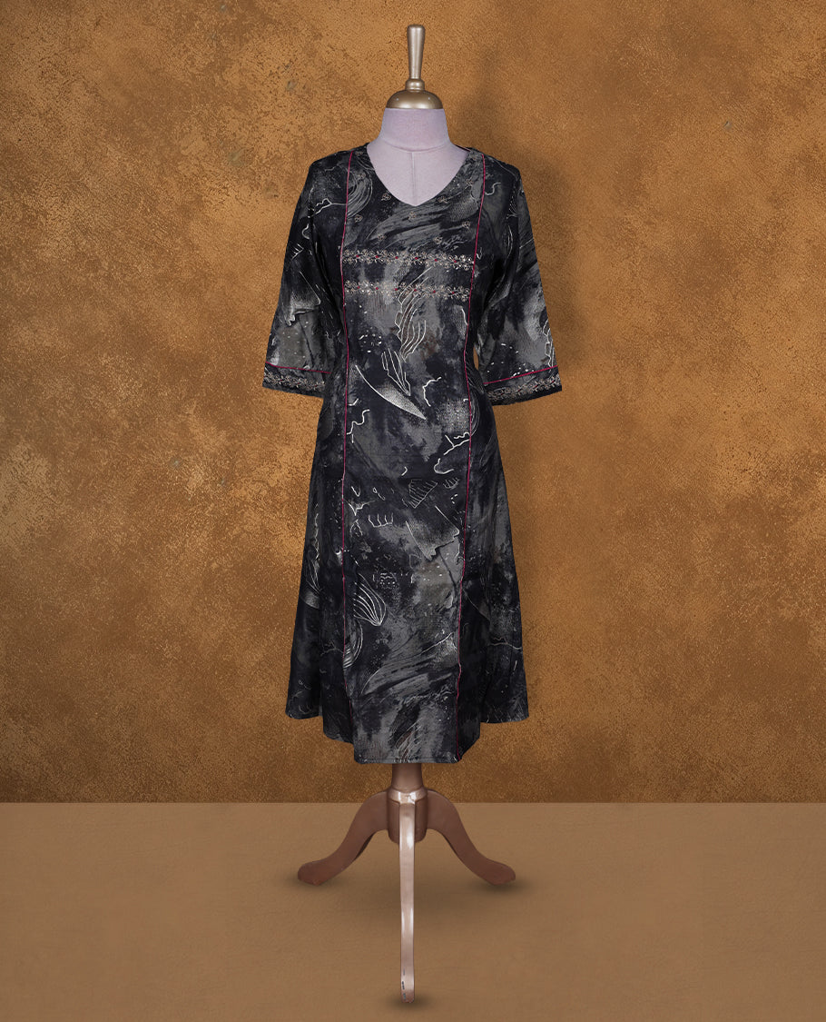 Black colour tie dye kurti BY TALISHA with abstract grey patterns, flared calf length silhouette, round neckline, three quarter sleeves, and contrast piping detail.