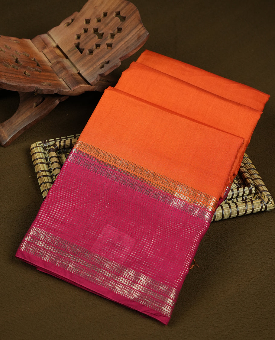 Orange colour mixed chanderi cotton saree with plain body, rani pink pallu and border with gold zari geometric motifs, and matching rani pink blouse