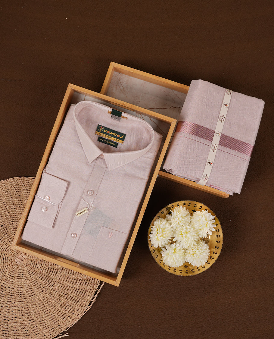 RAMRAJ Rose Gold Colour shirt paired with a matching dhoti, elegantly finished with a Rose gold border.