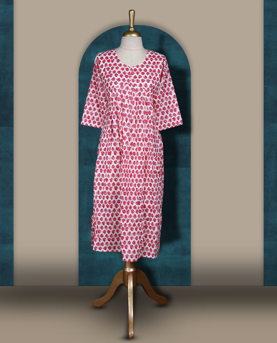 Off white colour kurthi with pink floral block print, round neckline, and 3/4th sleeves & Perfect for casual wear or work from home comfort, Style with leggings or wear solo for a chic look.