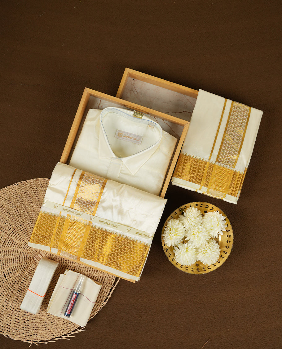 Cream gold coloured silk wedding shirt, dhoti, and towel set from MINISTER WHITE, featuring a gold zari border.